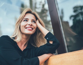 woman smiling with dental bridges in Chesterfield