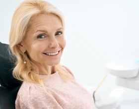 Woman smiling in the dental chair