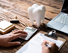 patient figuring out cost of dentures in Chesterfield