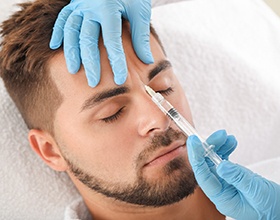 A man getting Dysport in his brow lines