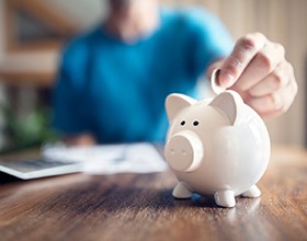 piggy bank representing cost of emergency dentistry in Chesterfield