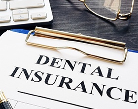 Dental insurance paperwork for the cost of dental implants in Chesterfield