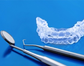 Invisalign trays and dental treatment tools