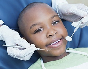 Smiling child in dental chair