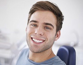 Man with healthy smile after dental services