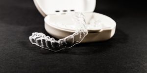Clear aligners and their case.