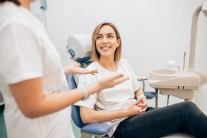 dentist in Chesterfield teaching a patient how to maximize dental insurance benefits 