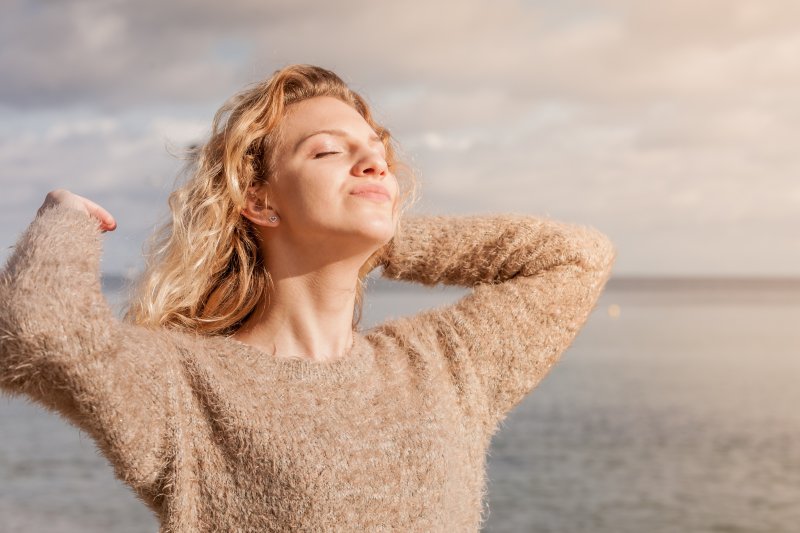 woman catching vitamin D through sunlight in Chesterfield